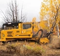 New Rayco Mulcher working in a field,Side of New Rayco Forestry Mulcher for Sale